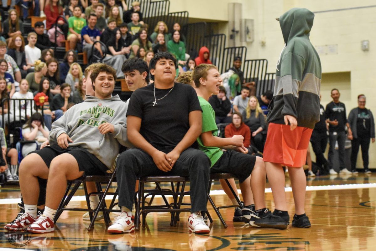 Students playing musical chairs at the assembly on October 6th, 2023.